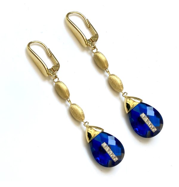 14kt yellow gold with blue quartz gemstone and cubic zircons.Rainbow collection.Gabriela Rigamonti's designer